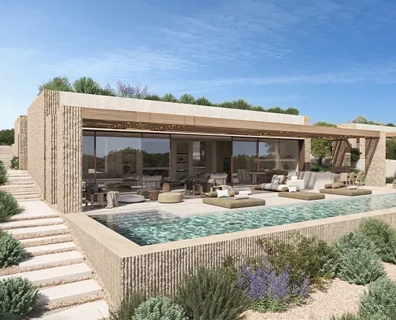 Luxury infinity pool with panoramic views and natural stone deck, seamlessly integrated into the architecture.