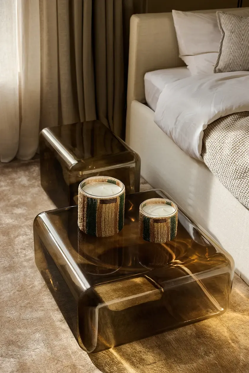 Contemporary guest bedroom with soft textiles and ambient lighting