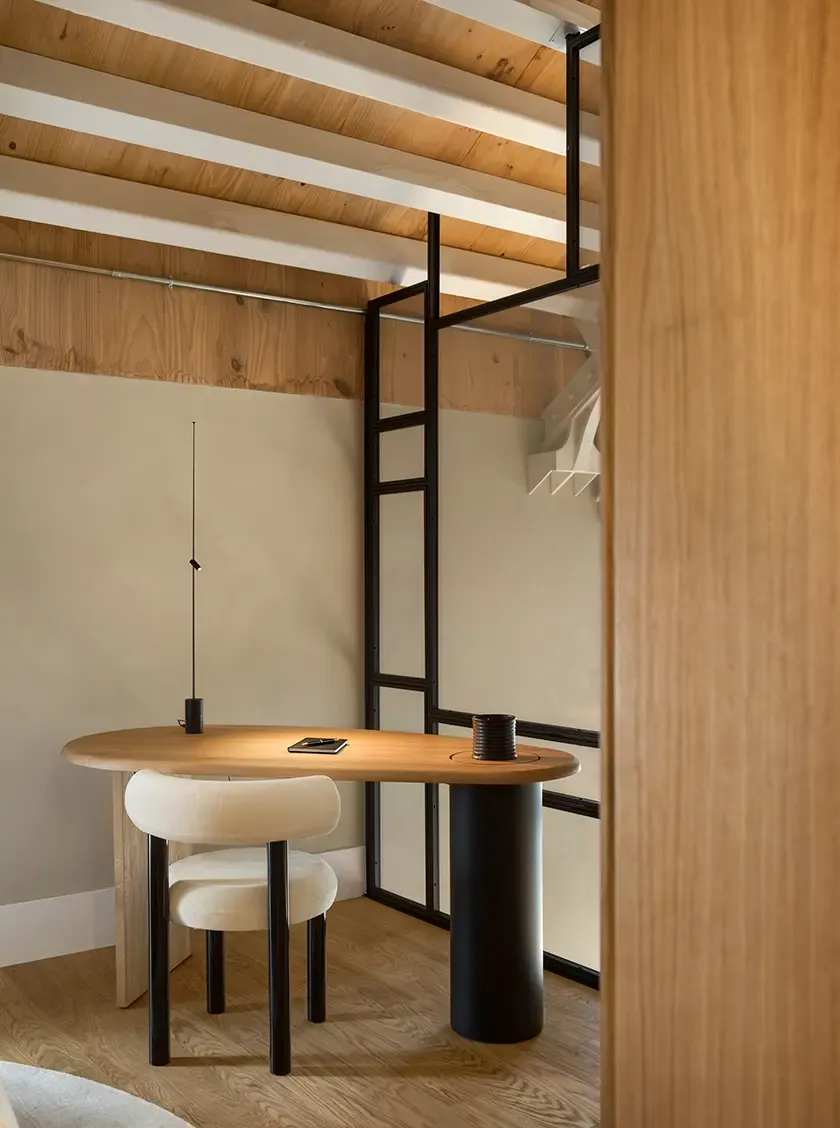 Minimalist workspace with oak desk and contemporary interior architecture