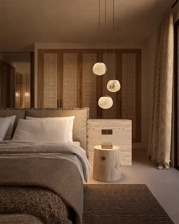 Serene bedroom with natural materials, custom lighting and minimalist interior design in luxury Cala Comte residence