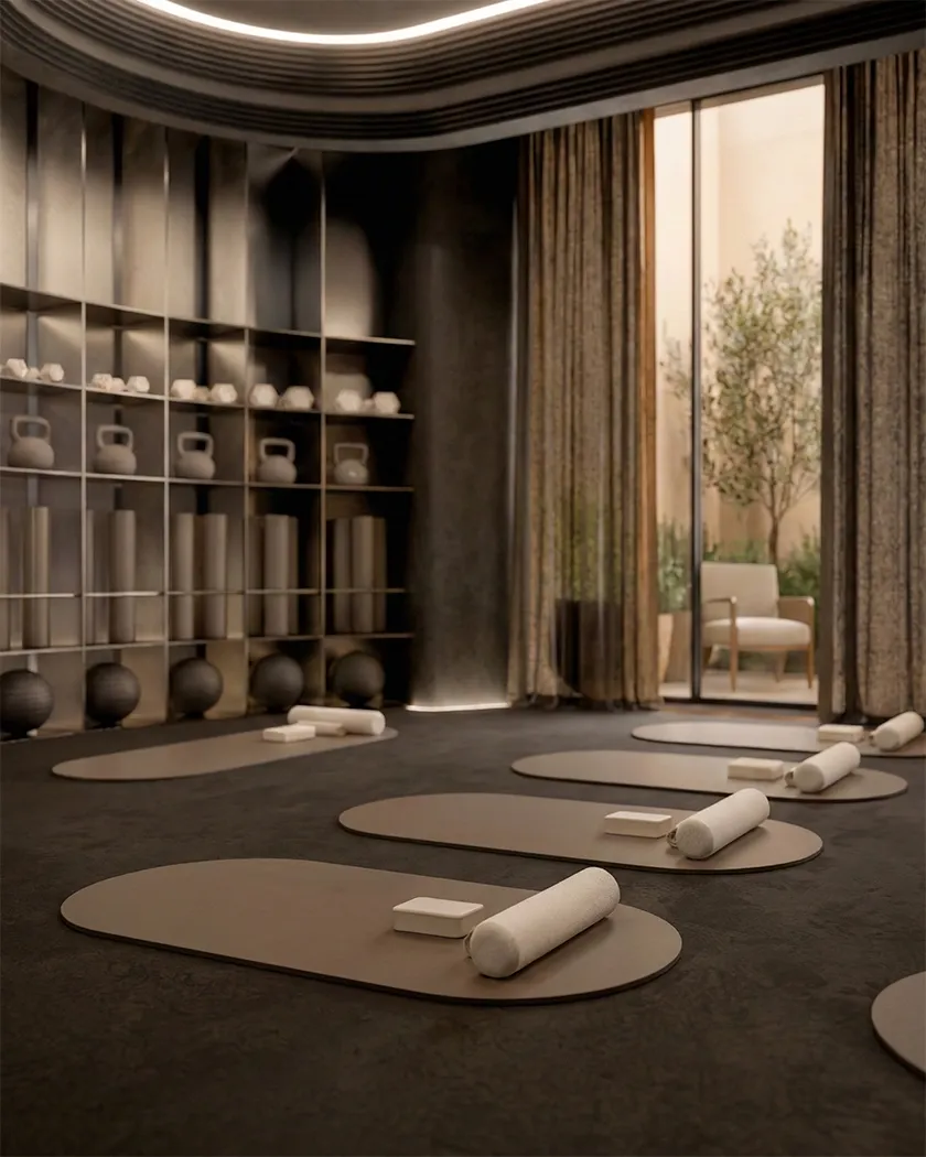 Wellness gym with curved architecture, exercise mats, natural textures and soft ambient lighting
