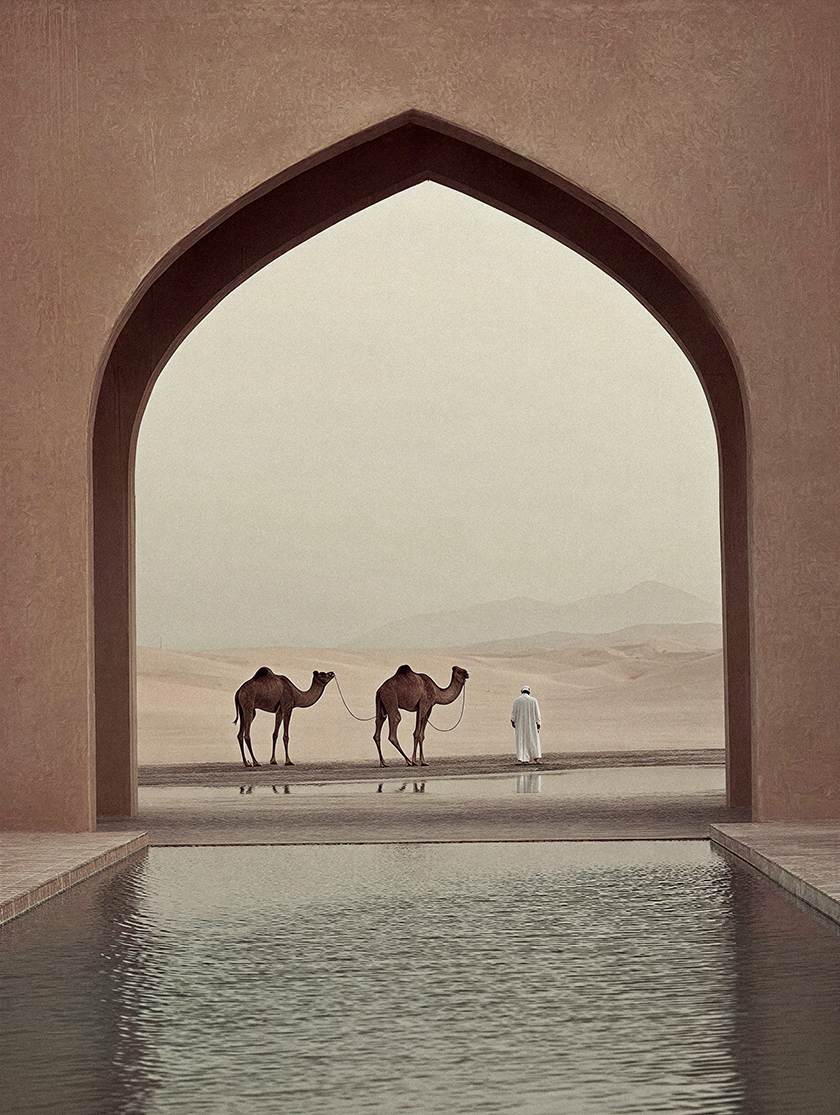 Monumental arched opening framing a desert landscape with camels, a reflective pool and traditional Middle Eastern architectural influences.