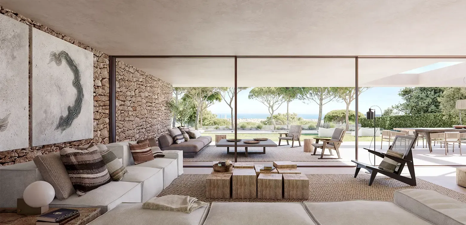 Open-plan living space with natural textures and panoramic sea views, crafted by Luv Studio in a luxury coastal home.