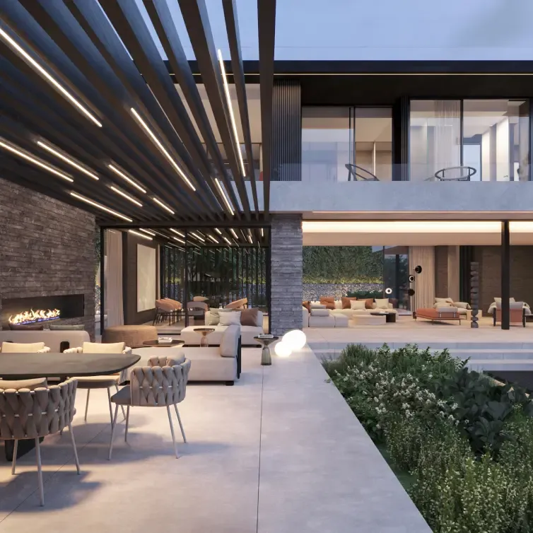 Covered outdoor lounge area with natural textures and designer furniture, overlooking the garden.