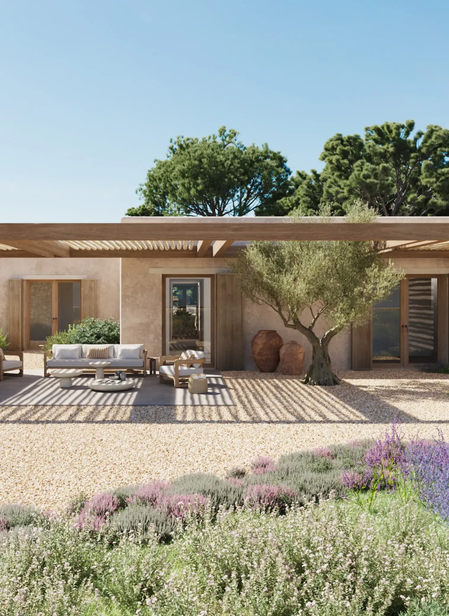 Serene rear patio with pergola, outdoor seating, and Mediterranean garden landscaping.