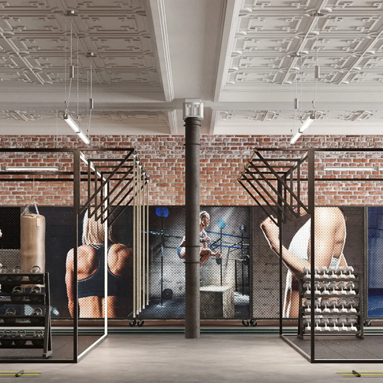 Industrial-style gym with boxing bags, kettlebells, and fitness murals on exposed brick walls.