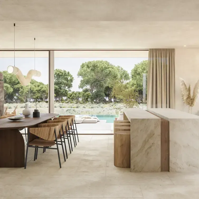Kitchen and dining room with views of garden and pool through large glass windows.