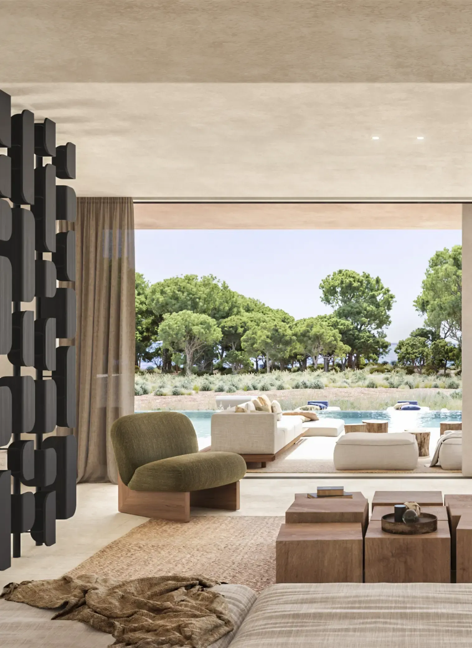 Modern living room with sofa, lounge chairs and pool view framed by floor-to-ceiling glass.