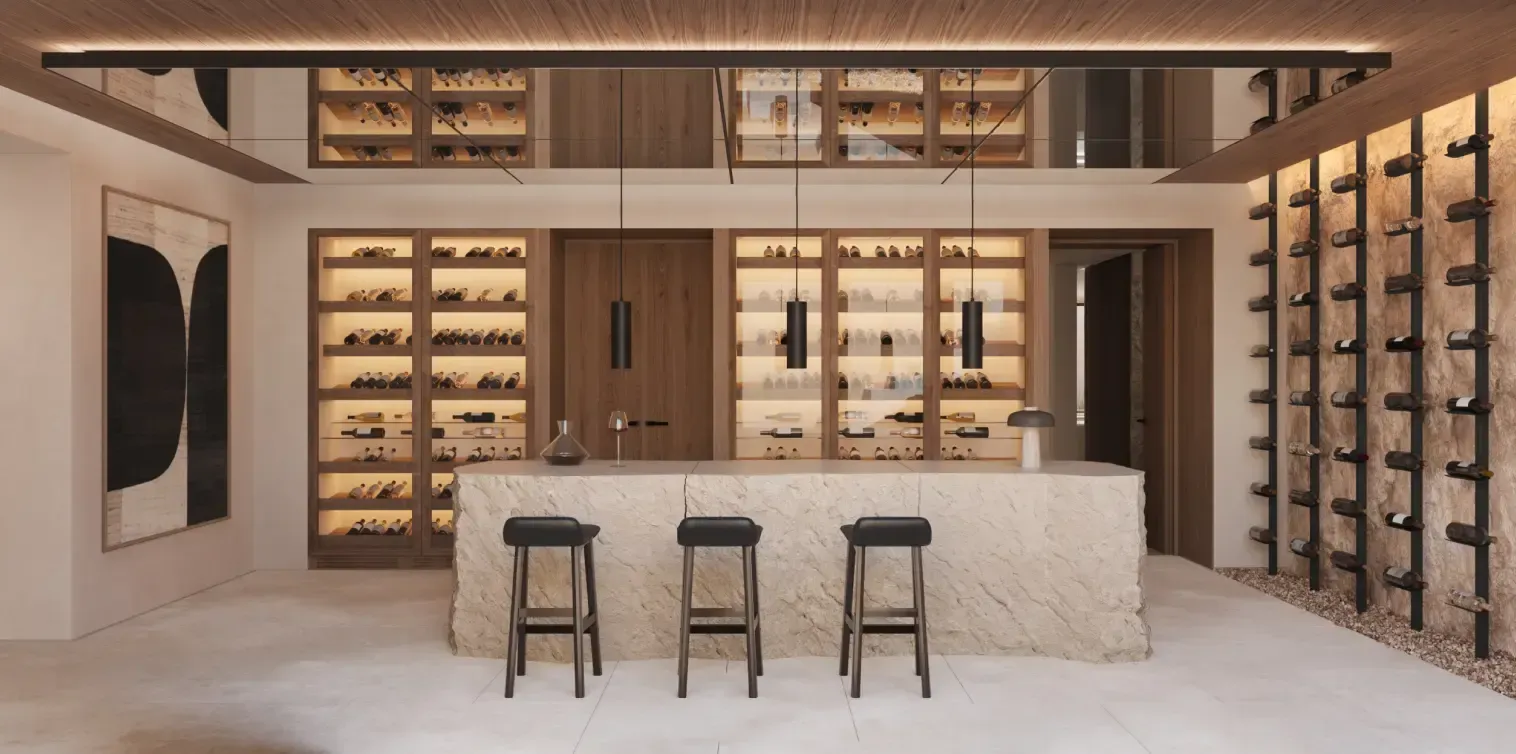 Luxury wine cellar with stone island, custom lighting and built-in wine racks.