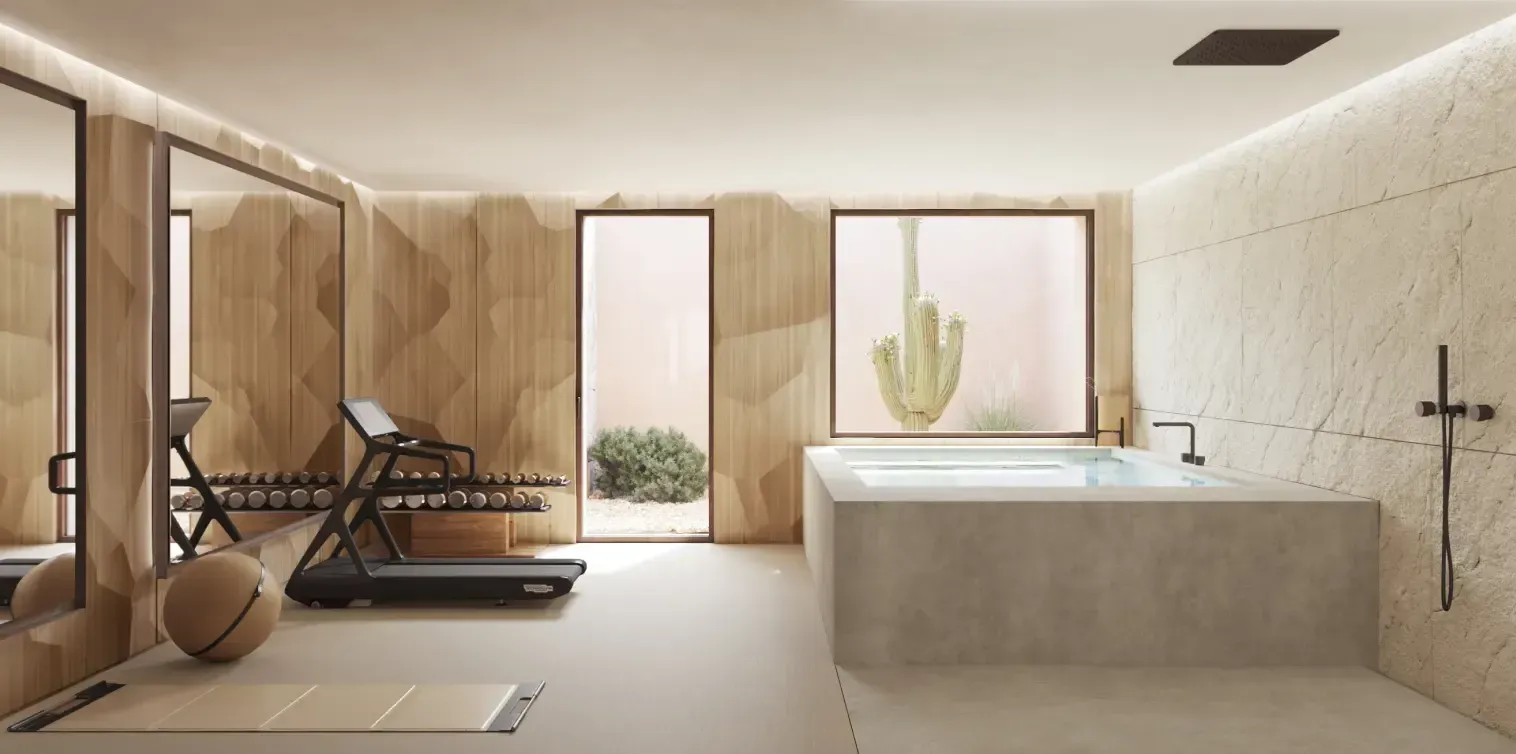 Private gym with spa-style hot tub, wood paneling and desert views.