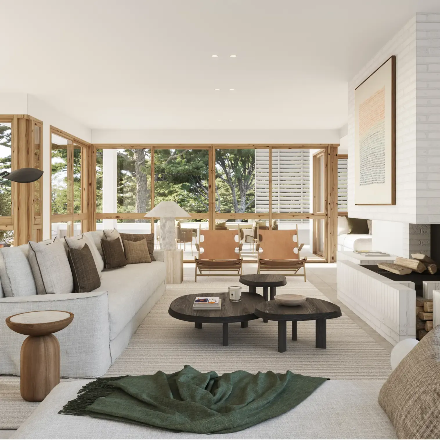 Cozy luxury living room with a fireplace, neutral tones, and large windows opening to lush greenery.
