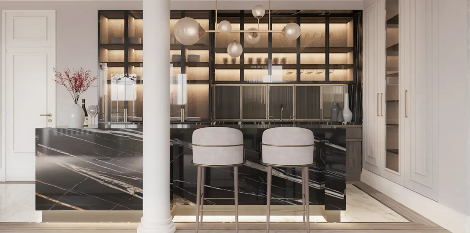 Sophisticated kitchen with marble island and backlit shelving, part of a Luv studio luxury penthouse in Barcelona.