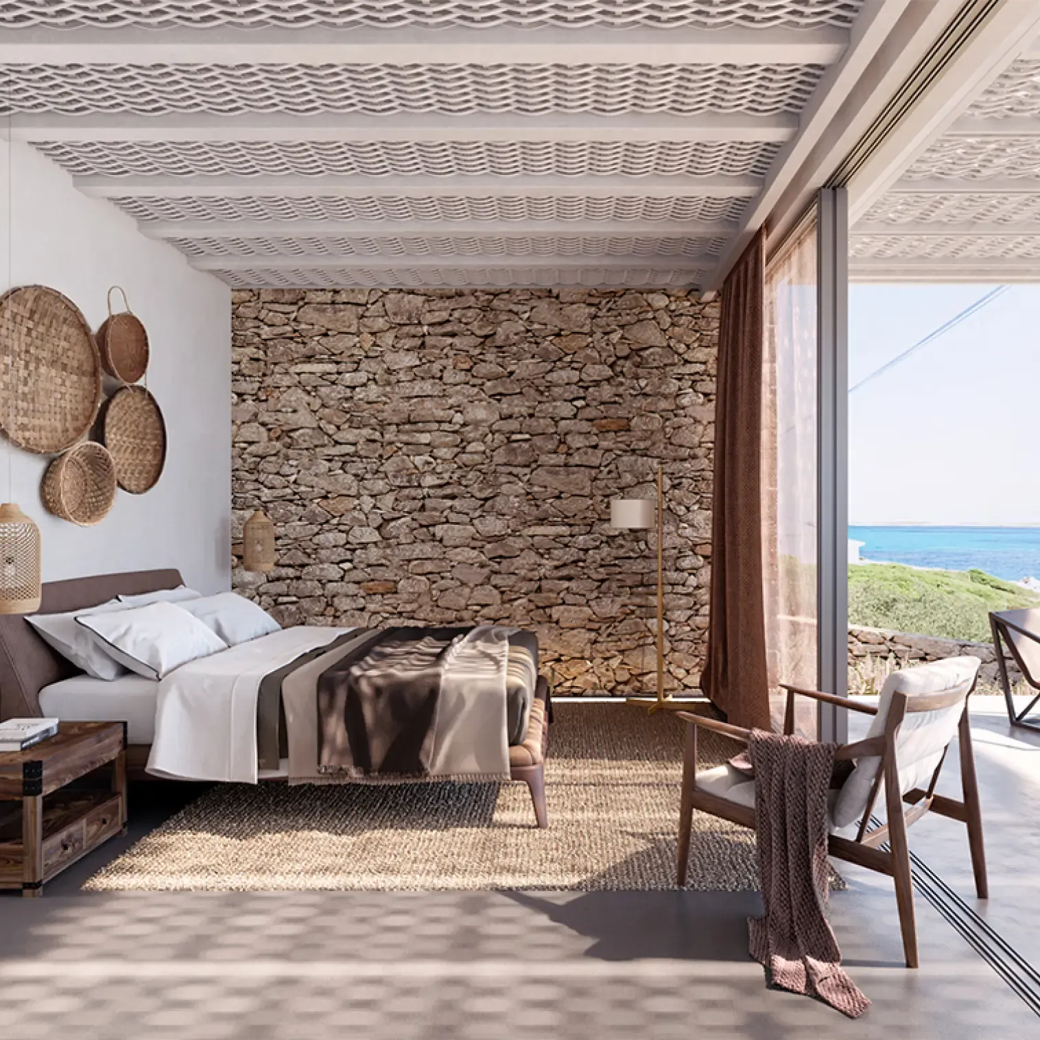 Open-plan living and dining area in a modern coastal villa, featuring natural textures and views of the sea.