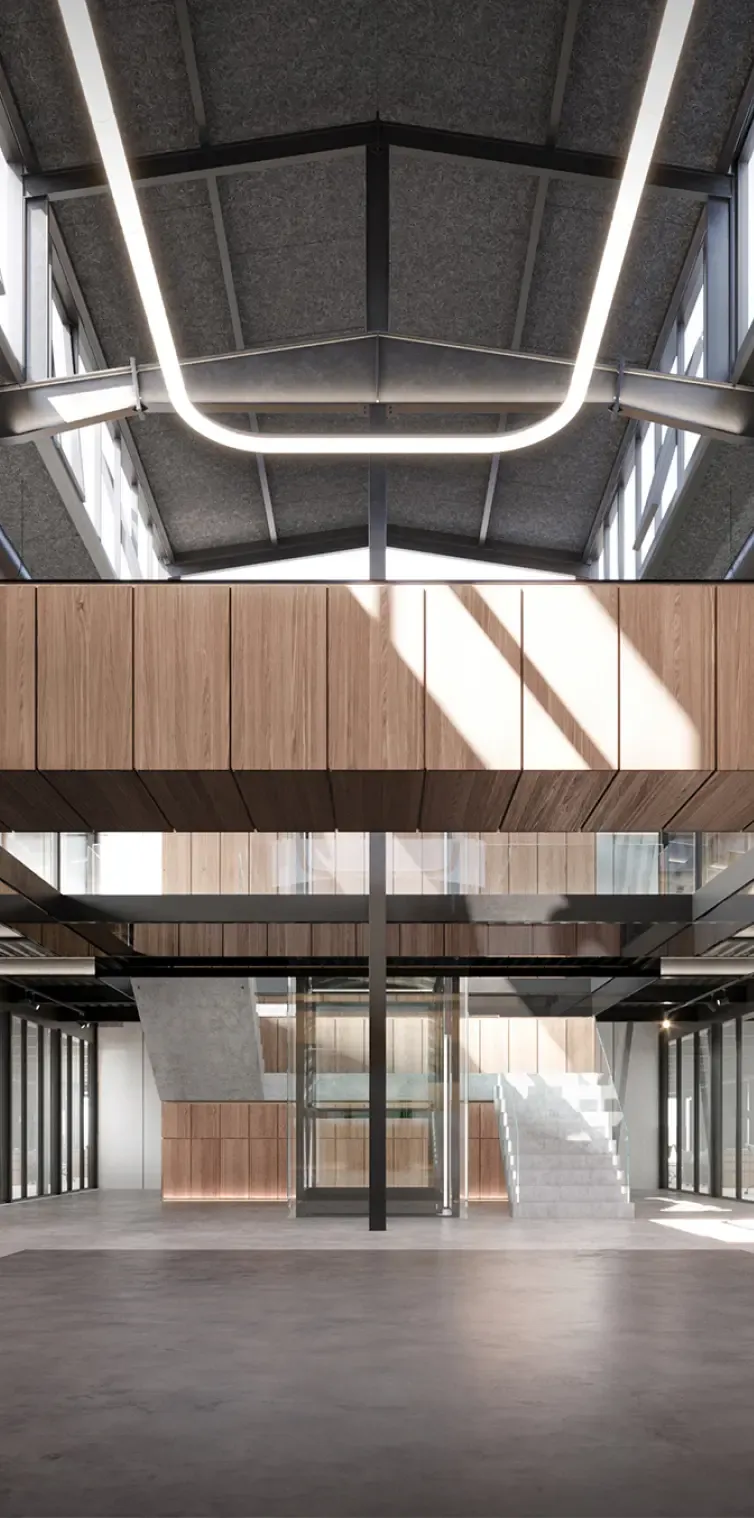 Central atrium with floating wooden walkway and skylight in Titan Building offices.