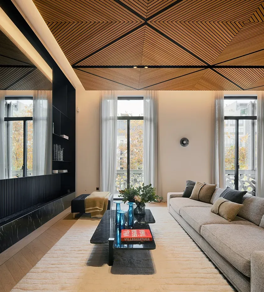 Elegant living area with panoramic windows and high-end architectural details.