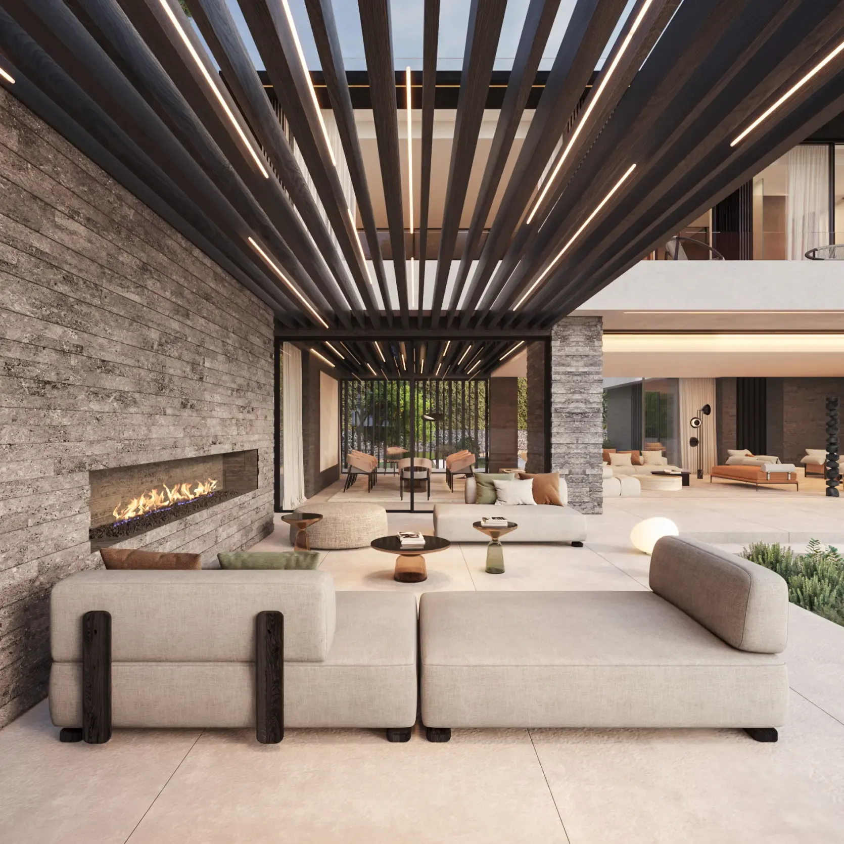 Contemporary outdoor lounge with a linear fireplace, wooden pergola, and seamless connection to the villa’s interior.