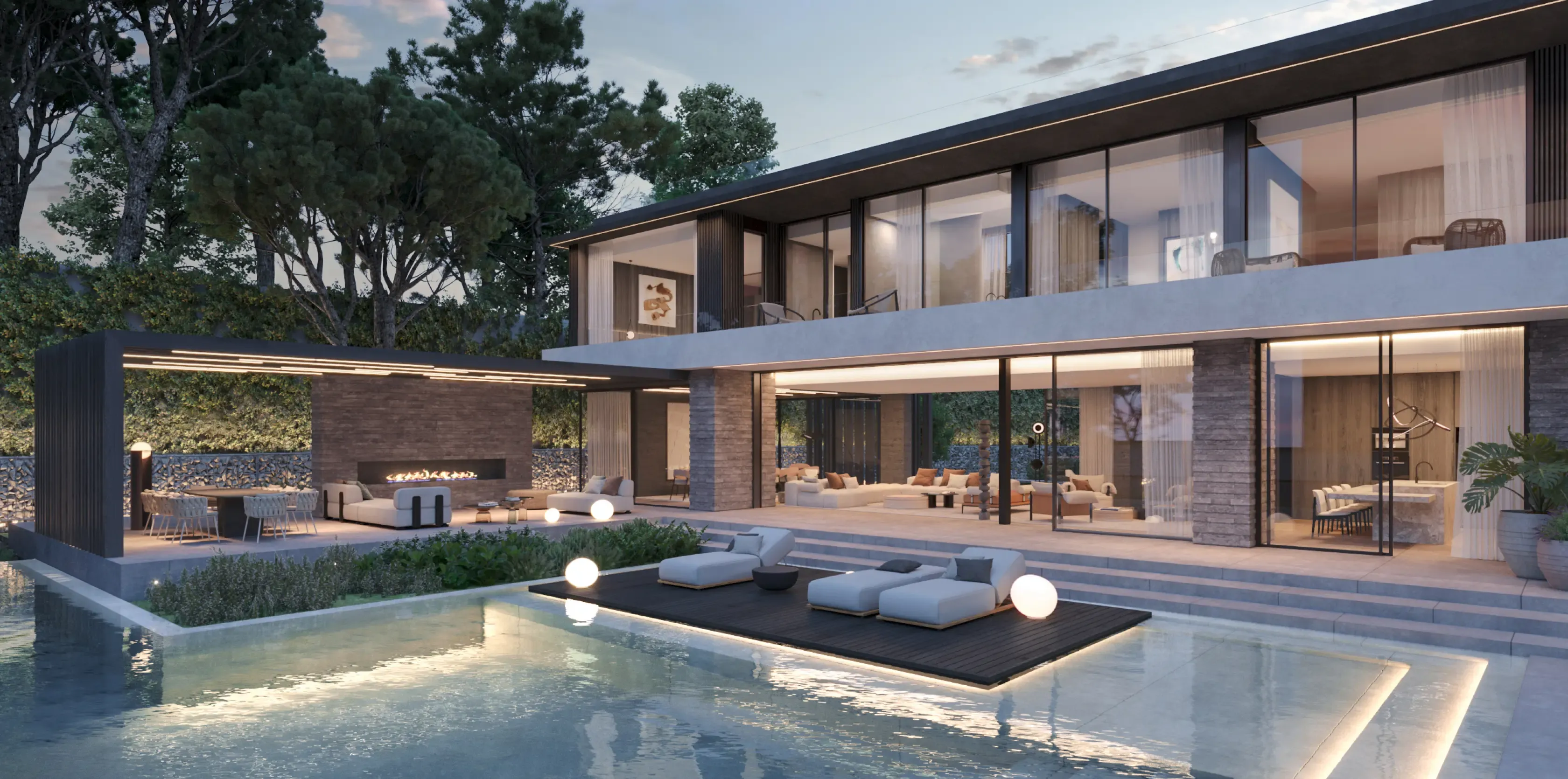Contemporary villa with illuminated poolside terrace and ambient outdoor lighting at night.