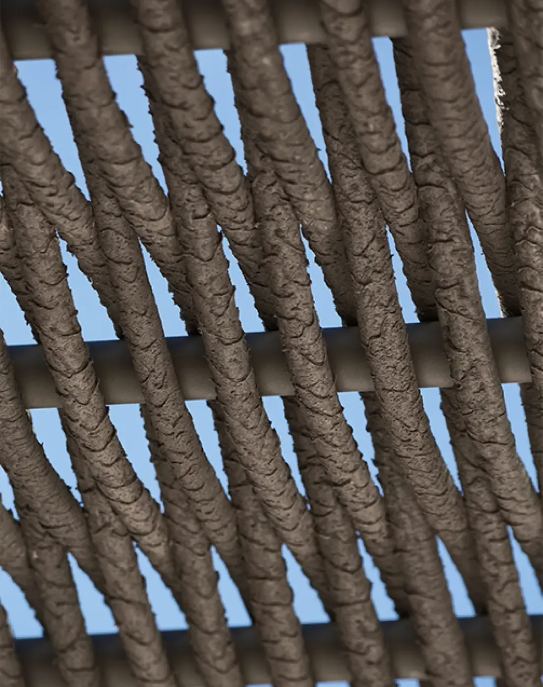 Close-up of handcrafted rope shading structure, showcasing texture and artisanal design details.