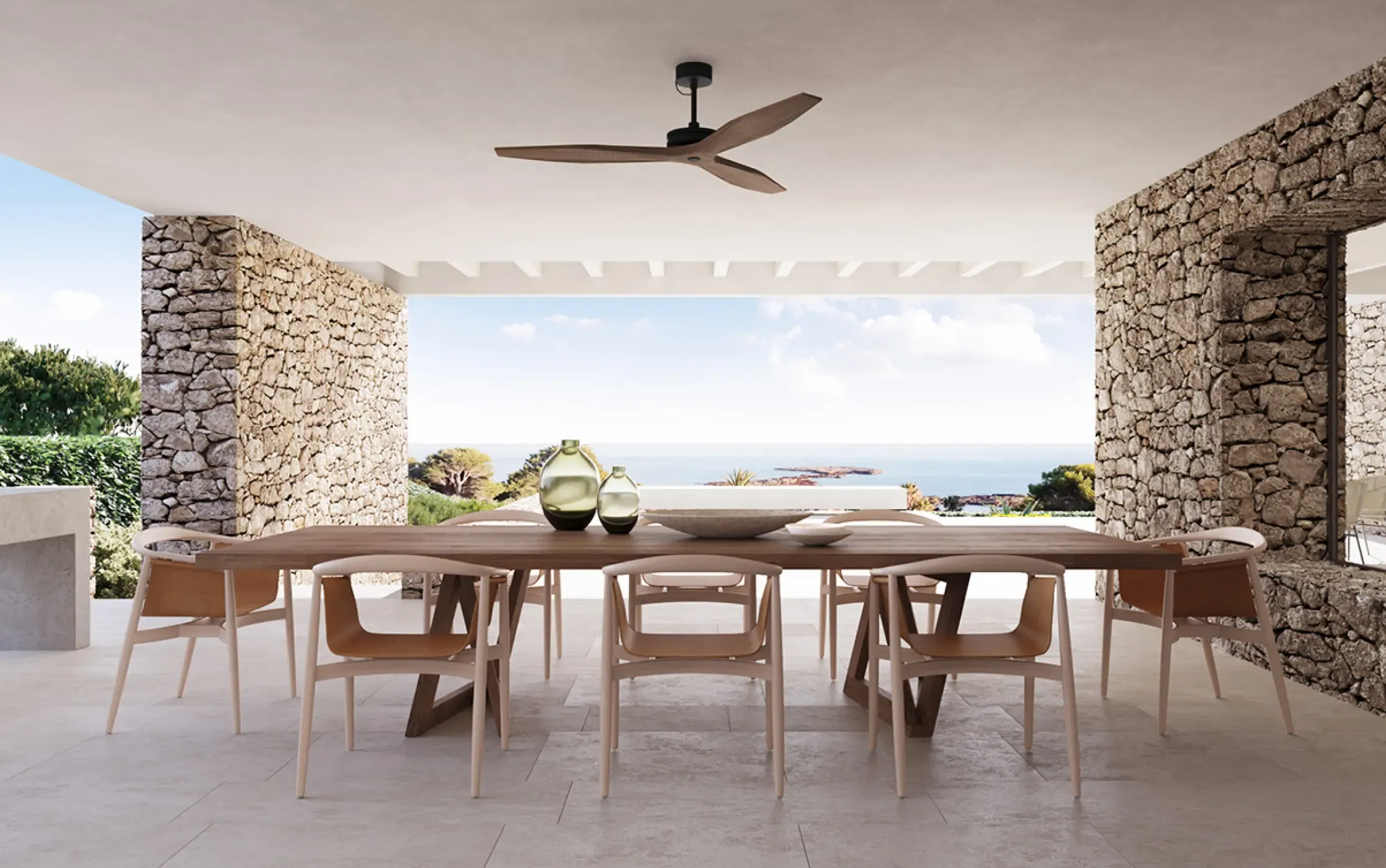 Minimalist dining space with wooden table and pendant lighting.