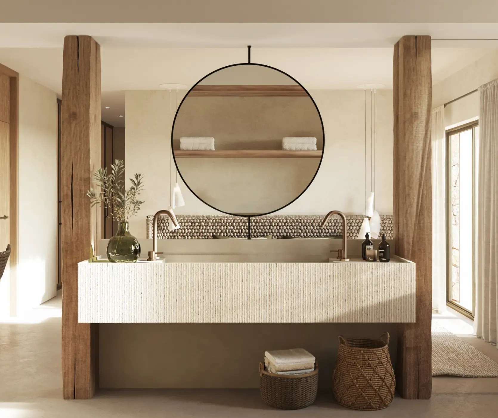 Sophisticated bathroom with double sink, round mirror and artisanal textures in a luxury beachside home.