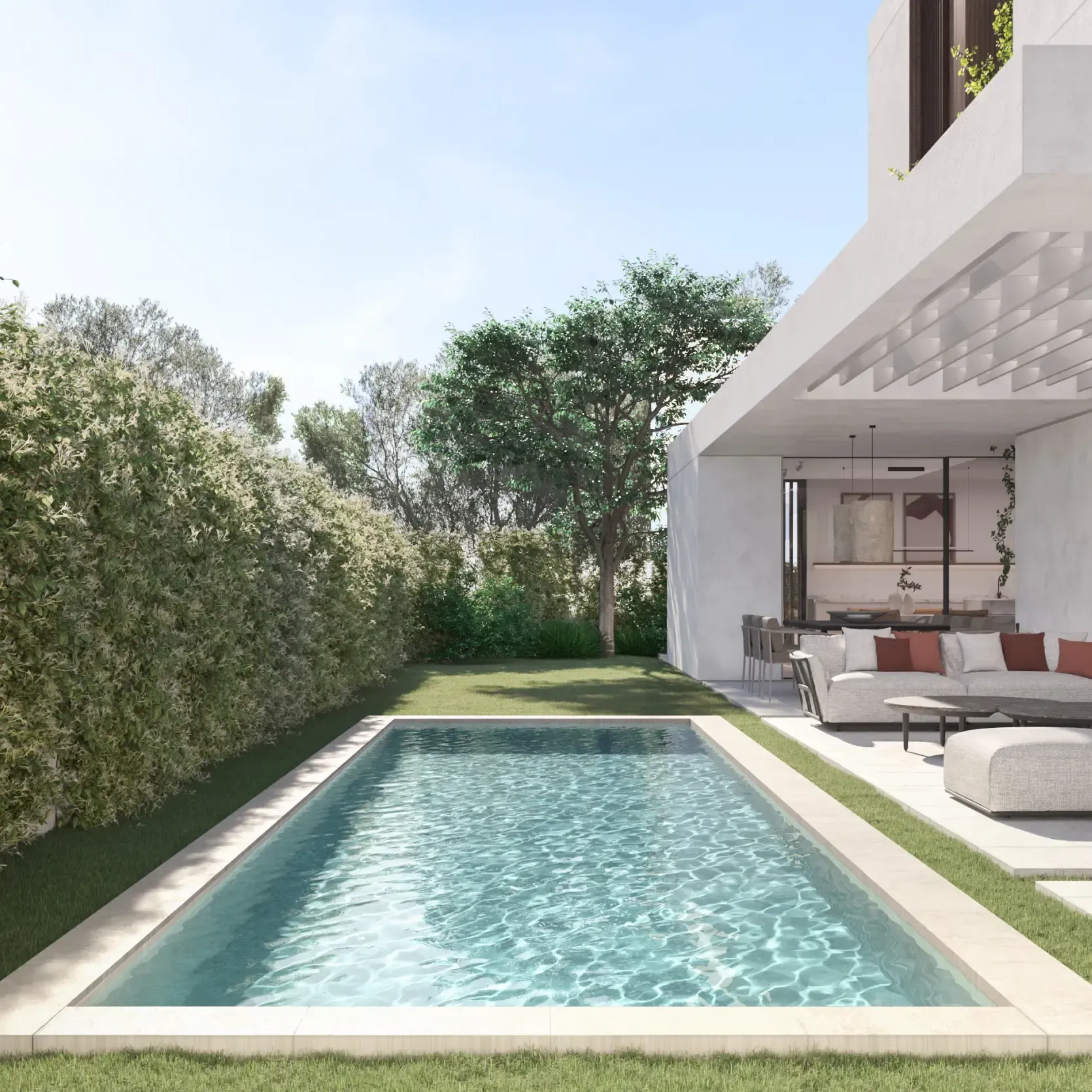 Private garden and pool area with shaded terrace, showcasing Luv studio’s seamless indoor-outdoor design.
