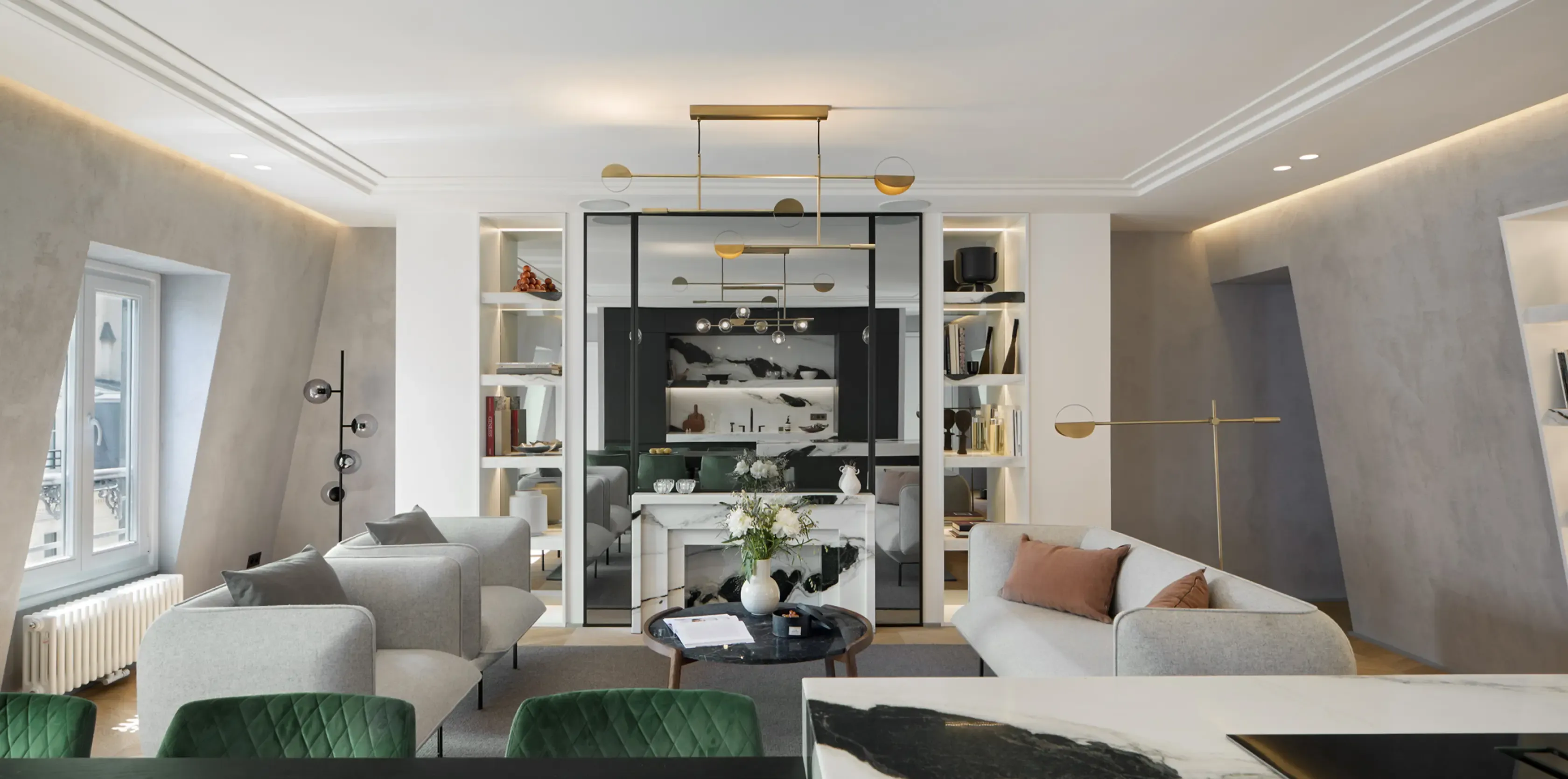 Elegant living area of Champs Elysées Apartment with modern sofas, marble accents, open shelving, and refined contemporary interior design.