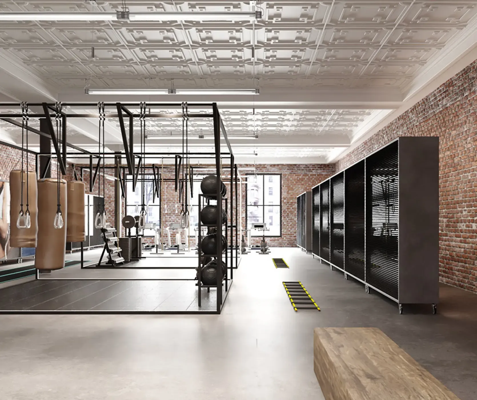 Spacious gym zone with boxing bags, weights, and functional training equipment under a detailed ceiling.