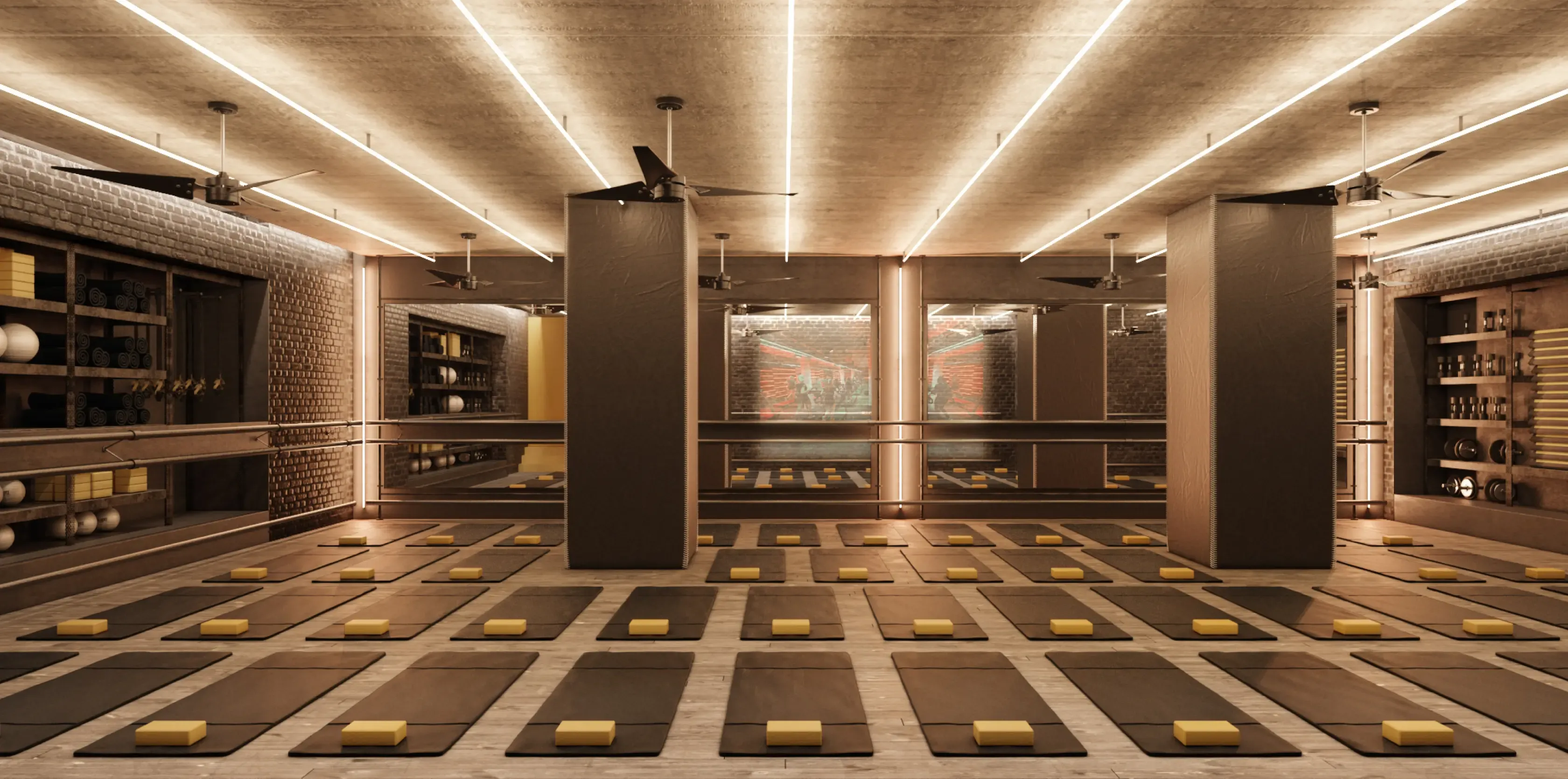 Warmly lit yoga or pilates studio with mats, props, and mirrored walls for group fitness sessions.