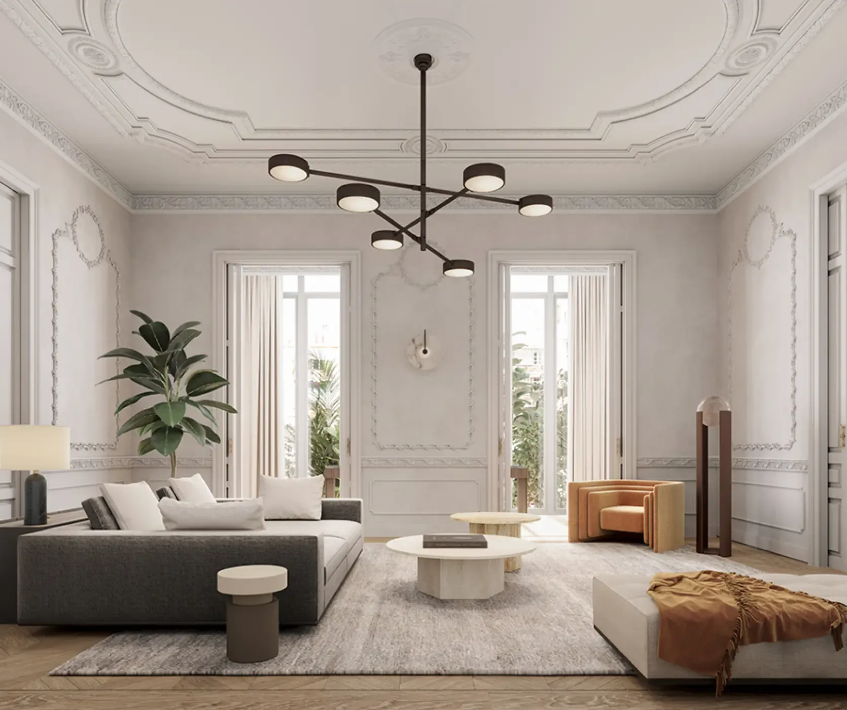 Stylish living room with designer furniture and classic molding in Gran Via Apartment