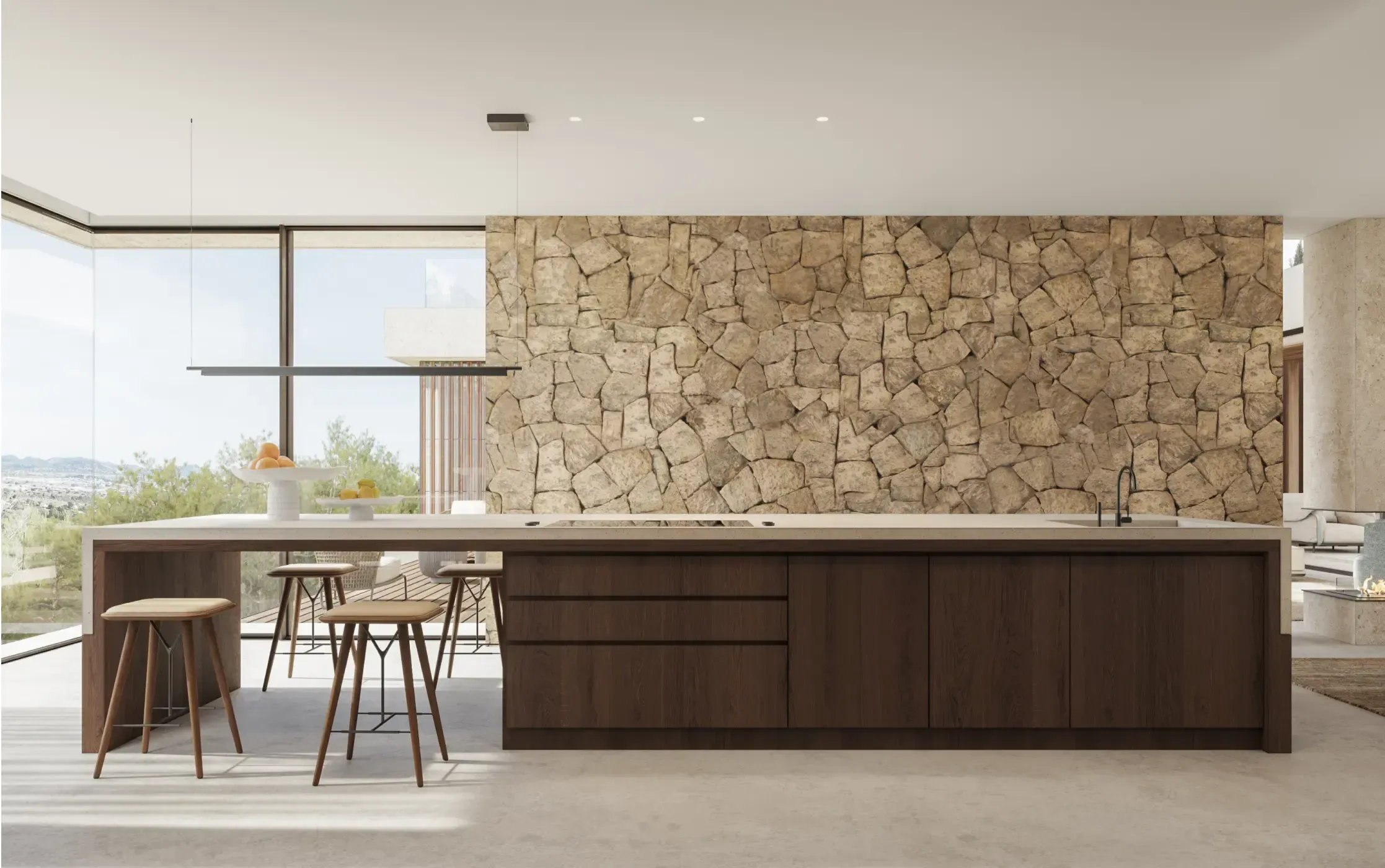 Minimalist kitchen with a central island, natural stone wall, and panoramic glazing.