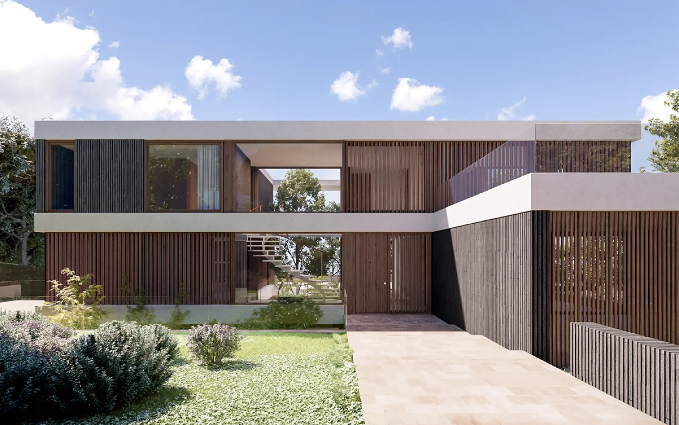Central entrance of the villa with open staircase and natural lighting