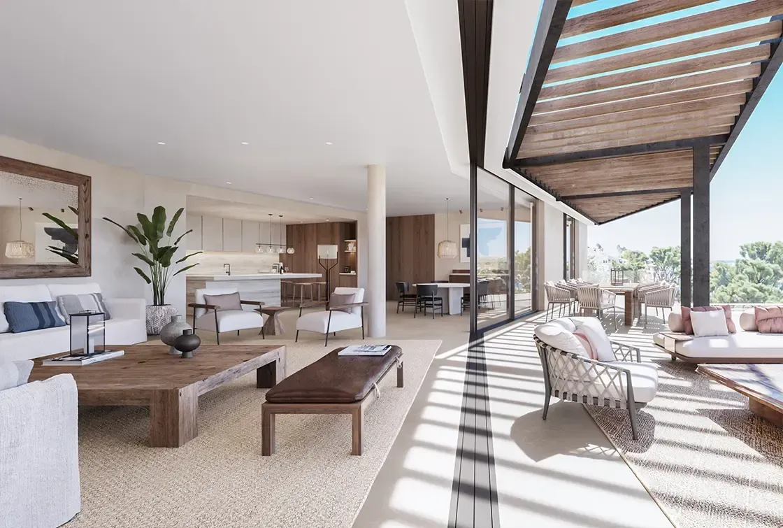 Open-concept living area with seamless indoor-outdoor flow and Mediterranean views, crafted by Luv Studio in Menorca.