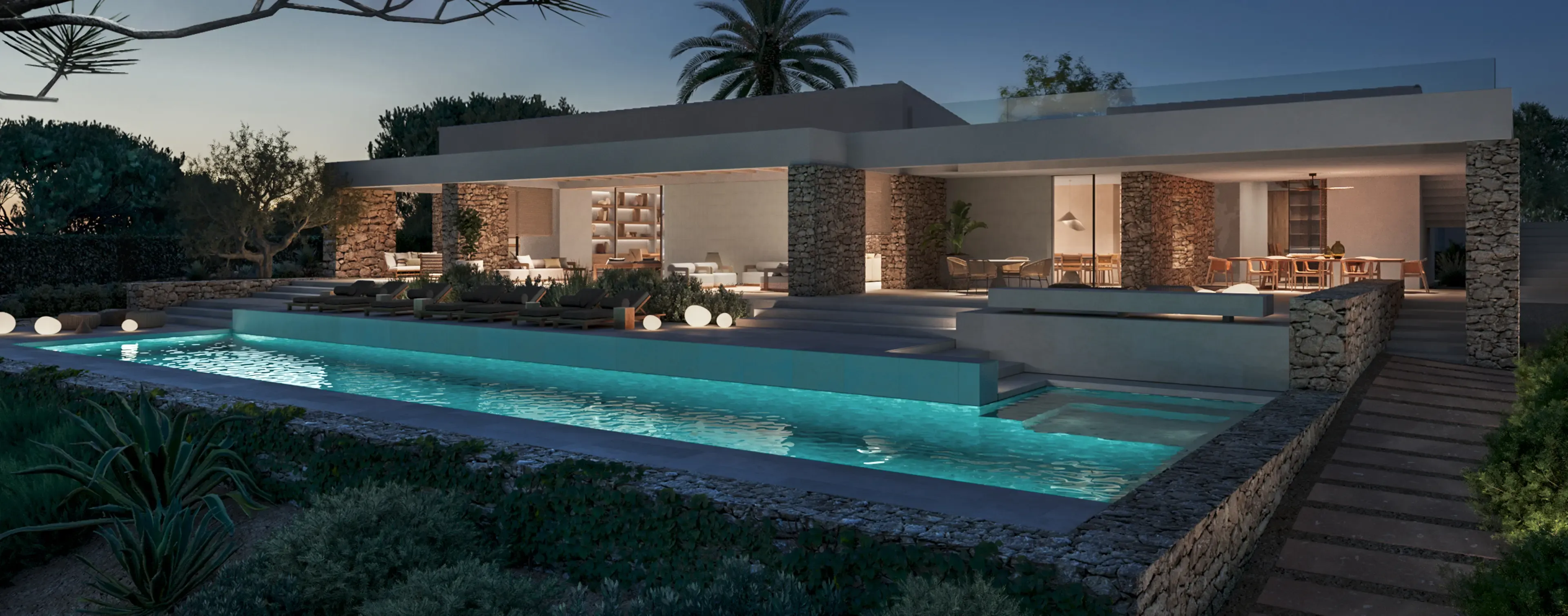 Architectural night view with ambient lighting and garden landscape.