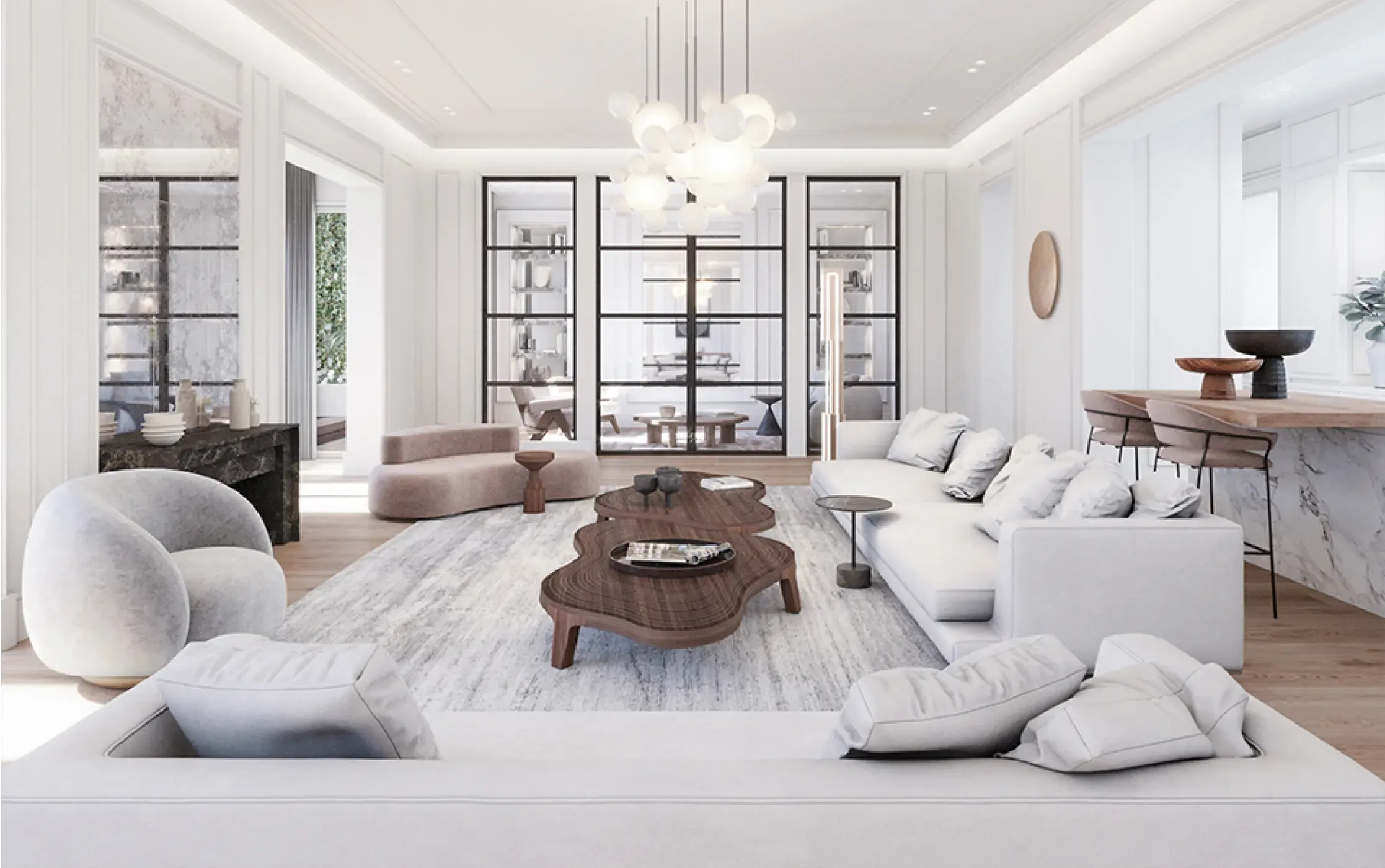 Symmetrical living room with round sofas, white walls, and a statement chandelier blending comfort and contemporary design.