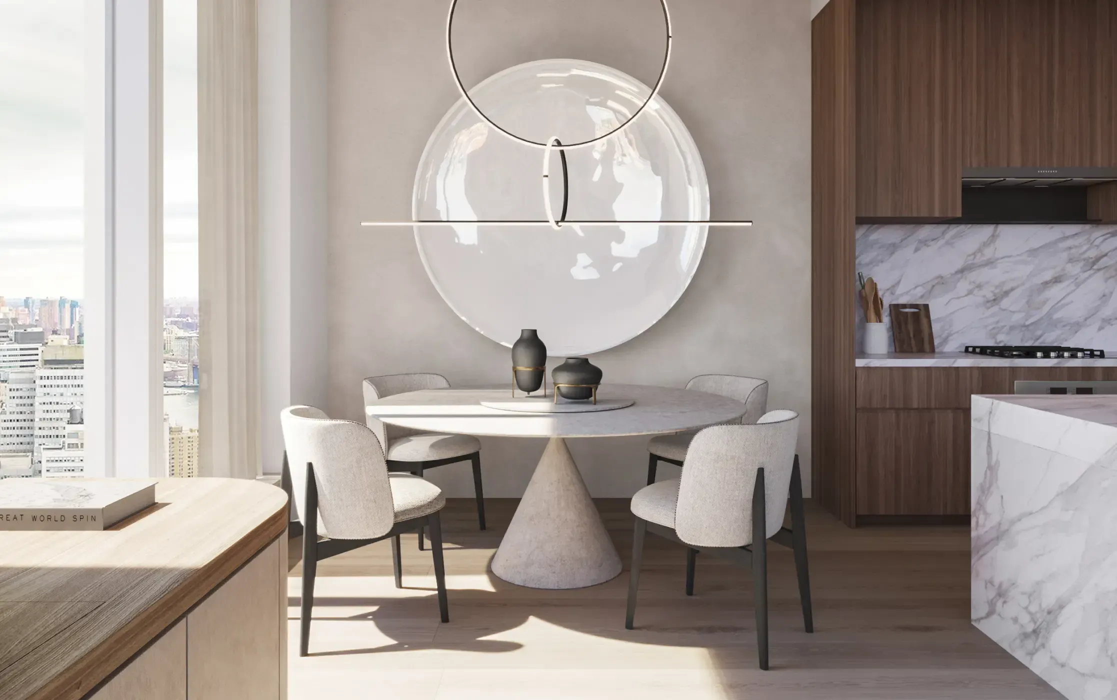 Minimalist dining nook with sculptural lighting and soft tones, designed by Luv studio in a high-rise luxury residence.