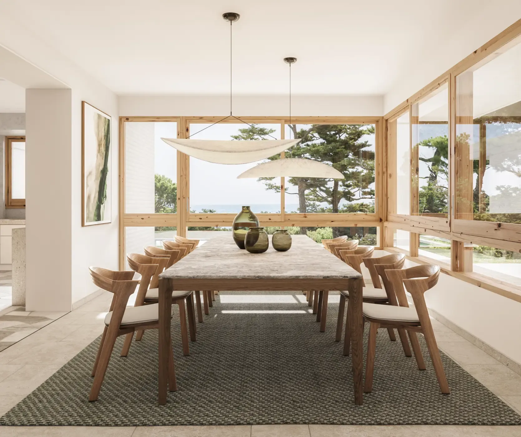 Bright dining area with wood-framed windows, designer chairs, and forest views in a contemporary luxury home.