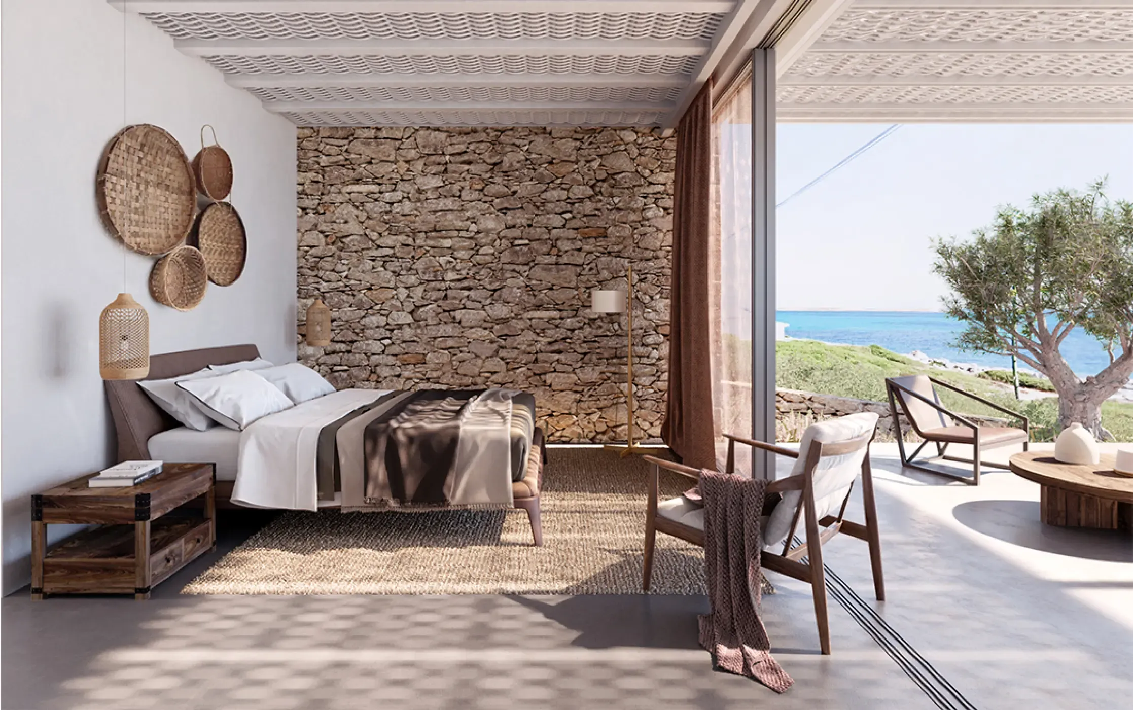Serene bedroom with a stone accent wall, woven decor, and direct access to the Mediterranean landscape.