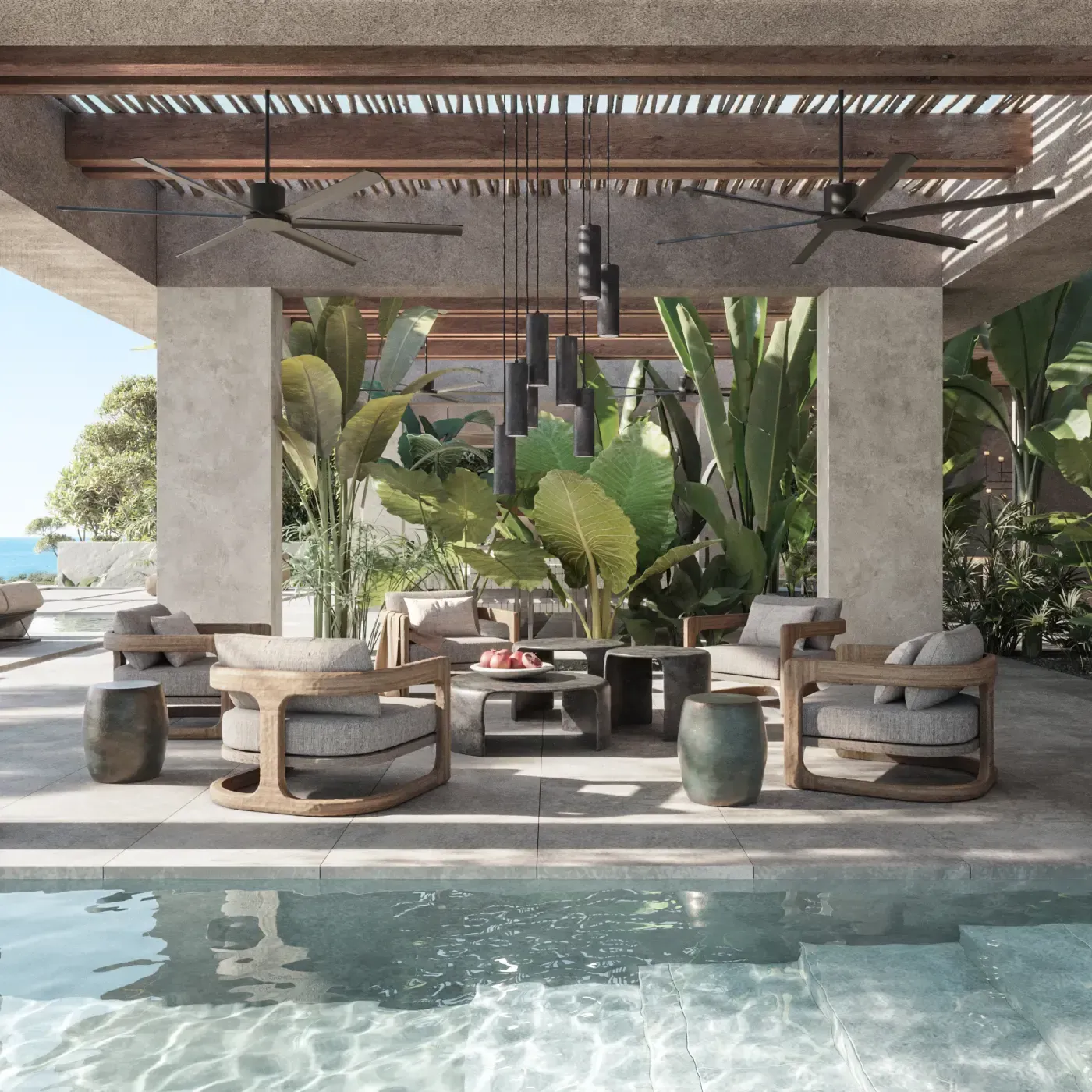 Covered terrace with modern lounge chairs and ceiling fans, overlooking a serene pool.
