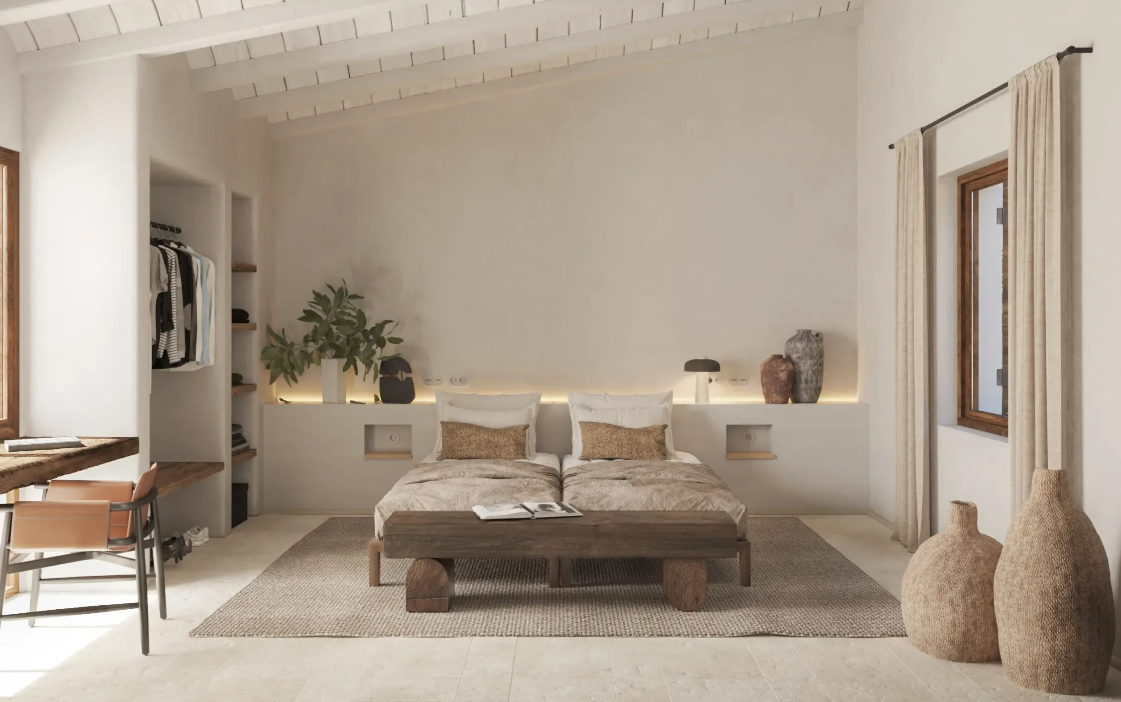 Bright bedroom with double beds, soft tones, and natural textures.